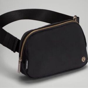 lululemon belt bag with gold accents